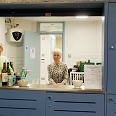 Committee members staff the bar